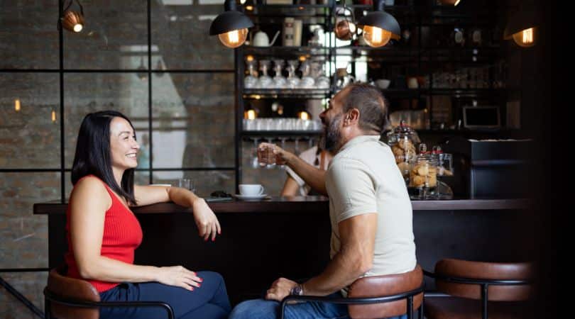 Couple chatting on a date for drinks