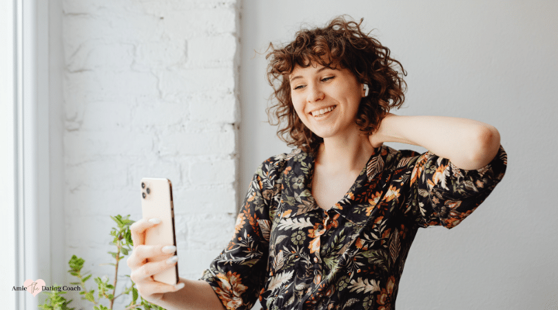 Girl smiling taking a selfie photo