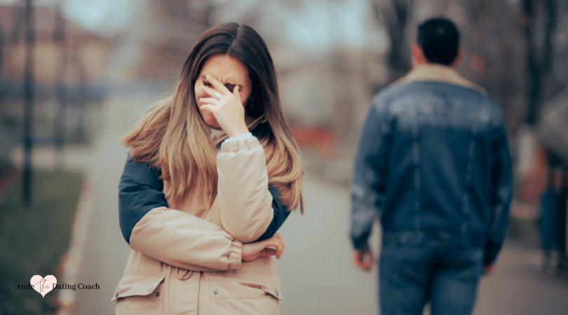 Woman crying while a man is walking away.