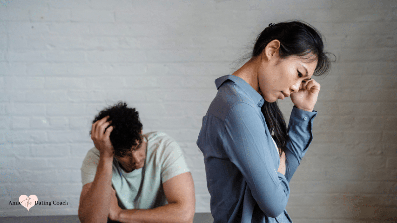 woman sad looking down as she is fighting with her partner