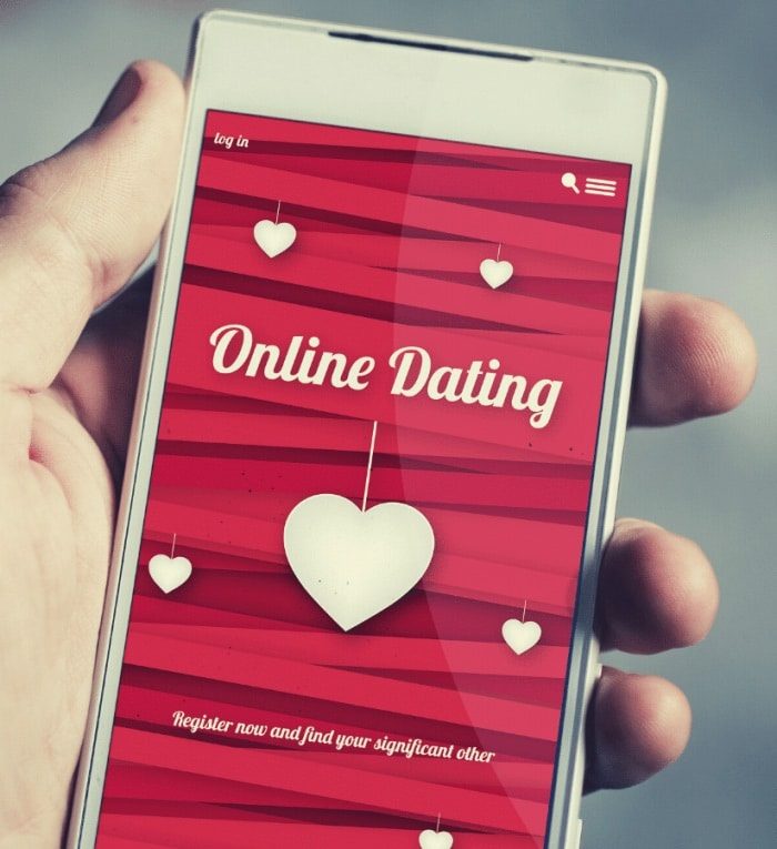 Man holding online dating on phone